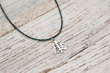 Chinese Health necklace with irridescent green