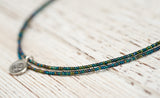 Mini Om necklace with double irridescent green