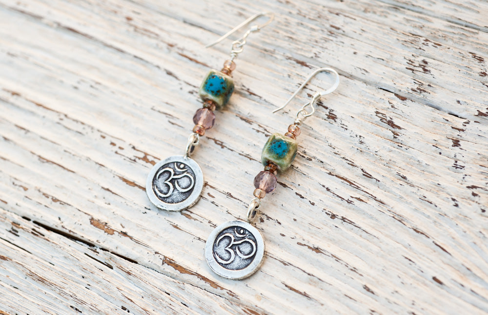 Om earrings with porcelain and rose glass
