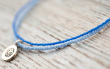 Silver Om anklet with double blue