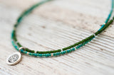 Silver Om anklet with double green