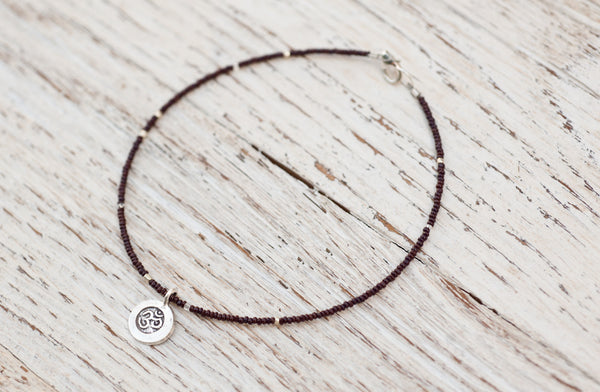 Silver Om anklet with chocolate