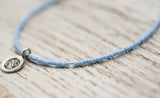 Silver Om anklet with sky blue