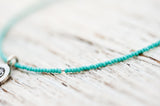 Silver Om anklet with turquoise