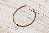Silver Om bracelet with bronze