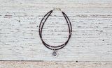Silver Om bracelet with double chocolate