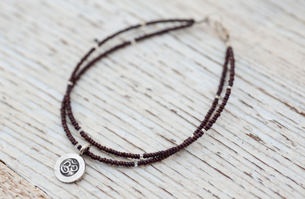 Silver Om bracelet with double chocolate