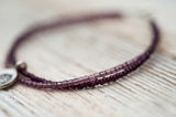 Silver Om bracelet with double purple