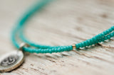 Silver Om bracelet with double turquoise