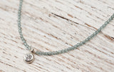 Silver Om necklace with montana blue