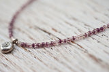 Silver Om necklace with purple and crystal