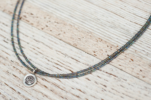 Mini Om necklace with double silver
