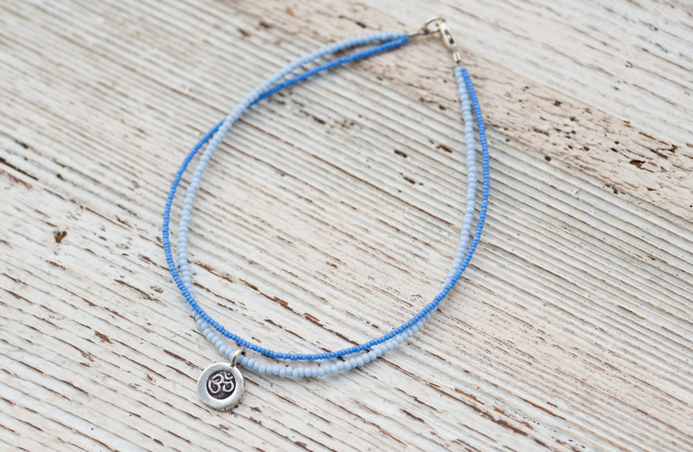 Silver Om anklet with double blue