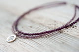 Silver Om anklet with double purple