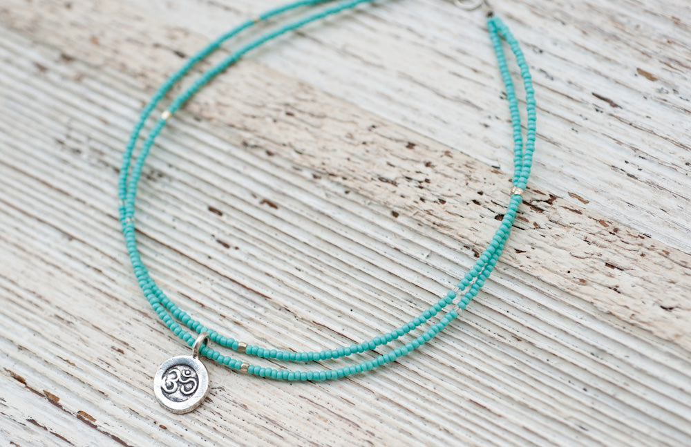 Silver Om anklet with double turquoise