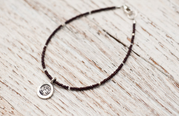 Silver Om bracelet with chocolate