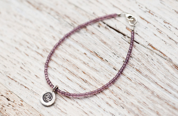 Silver Om bracelet with light purple