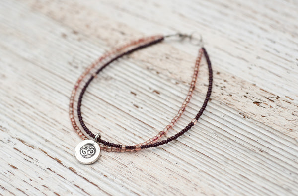 Silver Om bracelet with mauve and chocolate