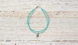 Silver Om bracelet with double turquoise