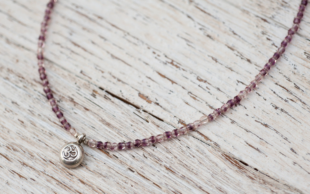 Silver Om necklace with purple and crystal
