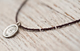 Small Om necklace with chocolate