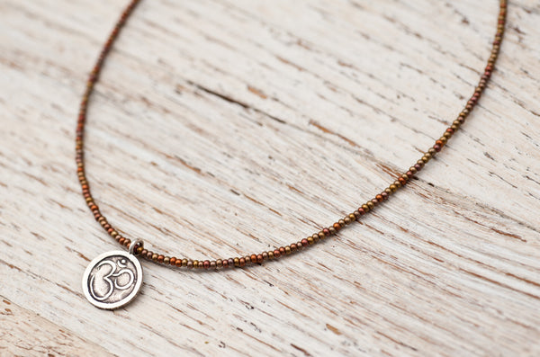 Small Om necklace with bronze