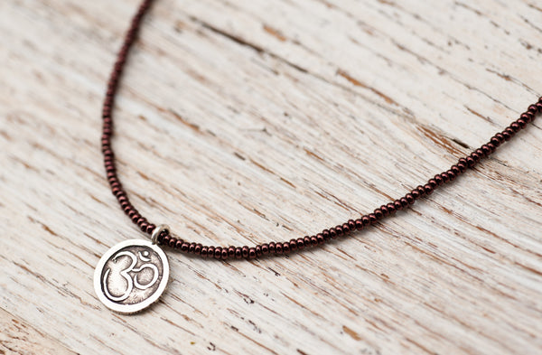 Small Om necklace with copper