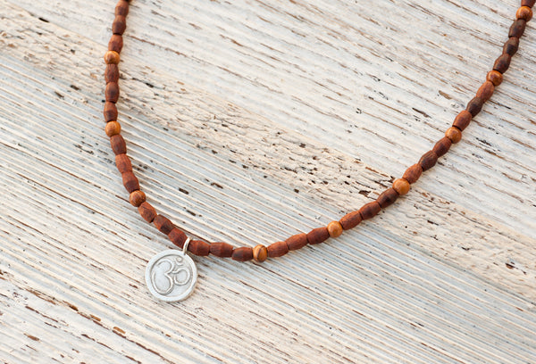 Wooden Om necklace with bayong accents